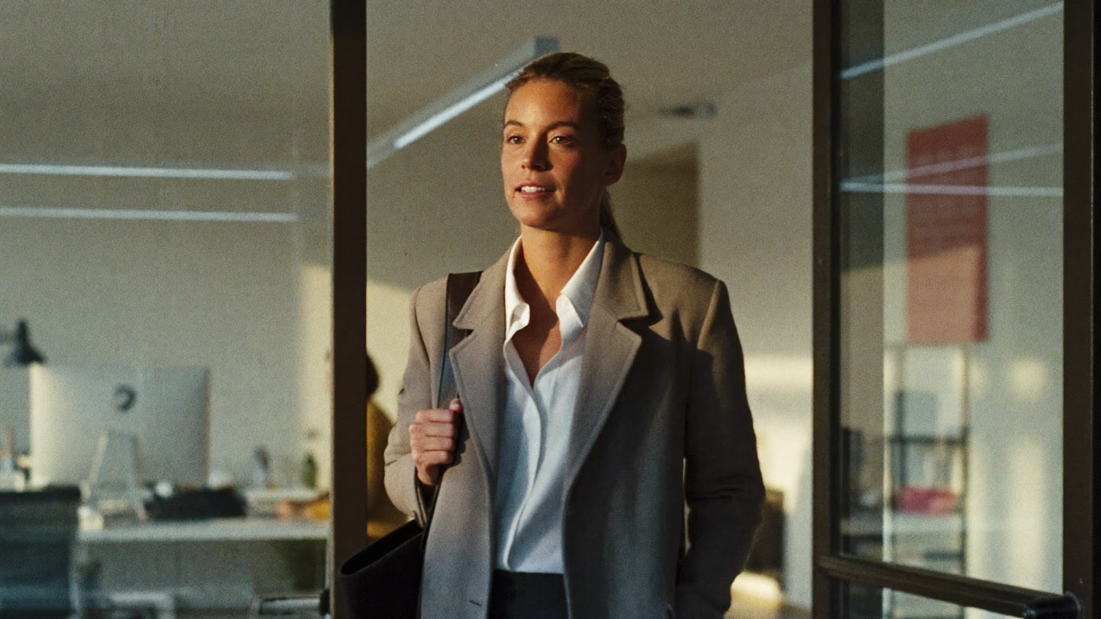 A founder leaving the office at five while the office behind her keeps working